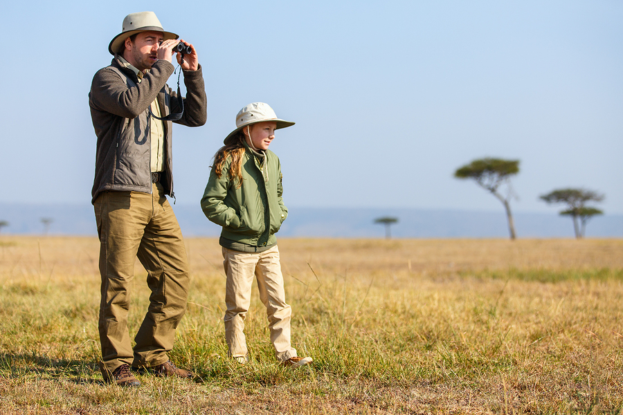 Family of father and child on African safari vacation enjoying b - Rent 4x4 Car Uganda uganda self drive packing list